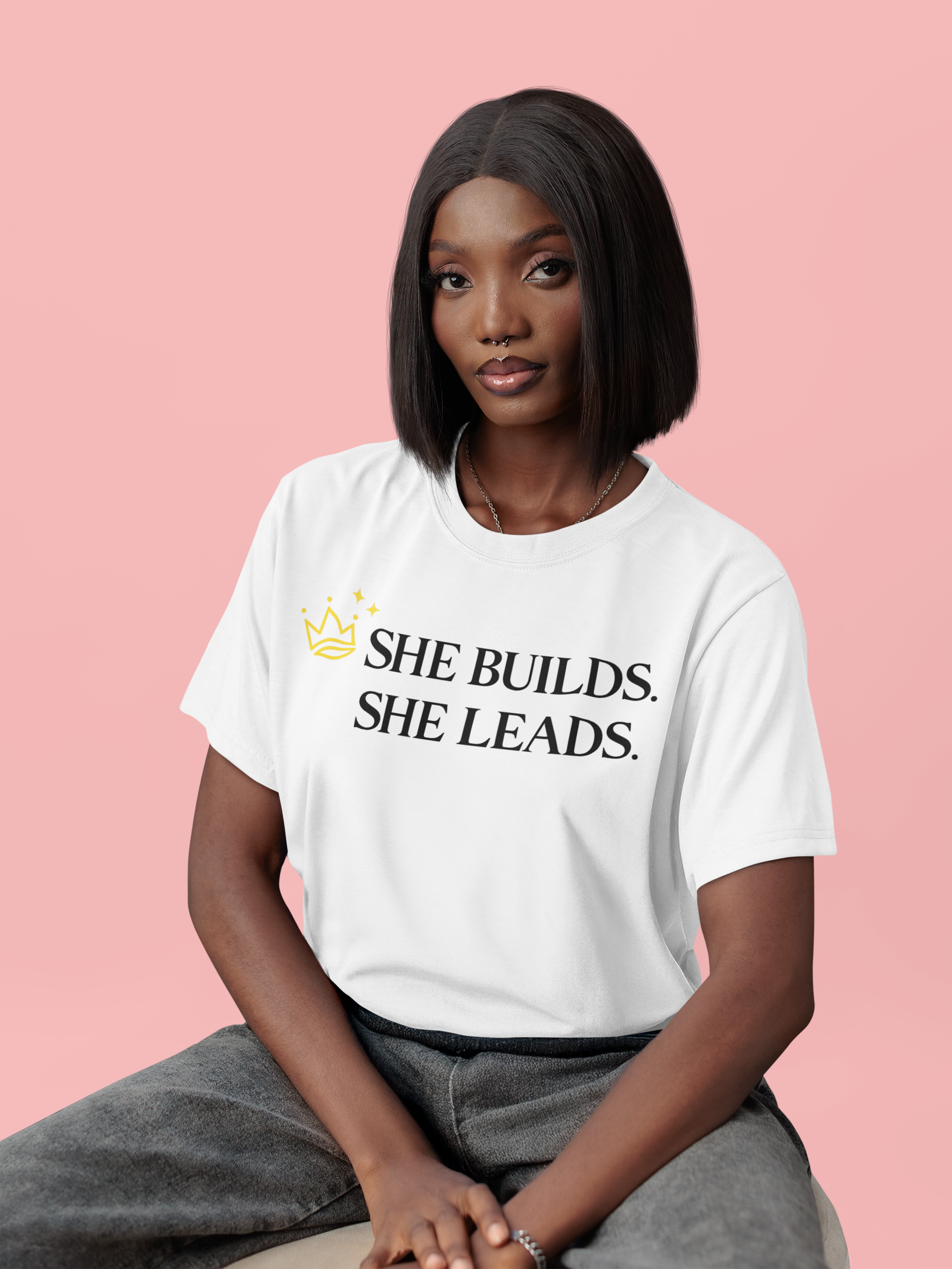 She Builds. She Leads. T-Shirt — Women's Leadership Graphic Tee